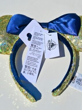 Disney Gold Sequin Minnie Ears Headband with Blue Bow